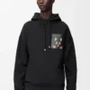 Sudadera con capucha de corte holgado en algodón negro Sudadera con capucha de corte holgado en algodón negro