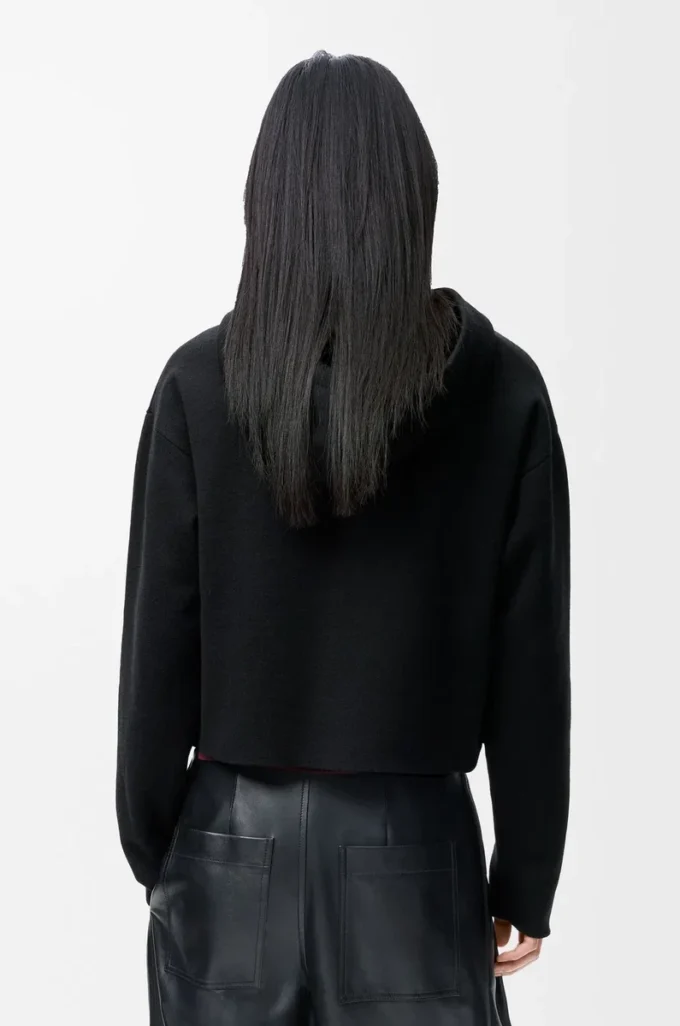 Sudadera con capucha y cremallera de lana.