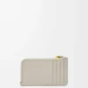 Tarjetero con nudo en piel de becerro napa brillante Shell Grey/Dandelion Tarjetero con nudo en piel de becerro napa brillante Shell Grey/Dandelion