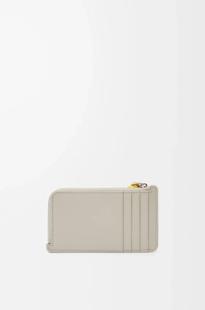 Tarjetero con nudo en piel de becerro napa brillante Shell Grey/Dandelion Tarjetero con nudo en piel de becerro napa brillante Shell Grey/Dandelion