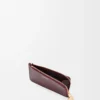 Tarjetero Pebble en piel de becerro napa brillante Burgundy Tarjetero Pebble en piel de becerro napa brillante Burgundy