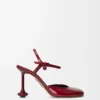 Zapatos de salón Toy con correa al tobillo en suave piel de cordero charolada. Rojo oscuro Zapatos de salón Toy con correa al tobillo en suave piel de cordero charolada. Rojo oscuro